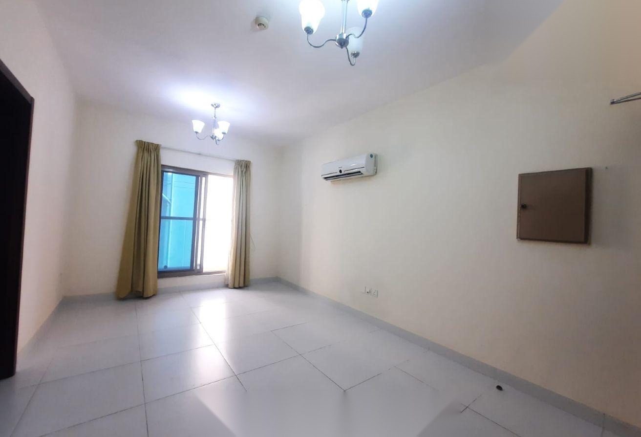 1-Bedroom Semi Furnished Closed Kitchen