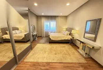 Fully Furnished 2-Bedroom Apartment with Balcony in Seef