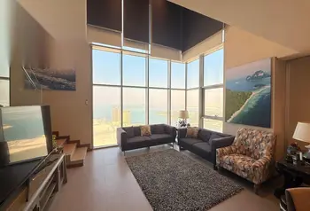 1-Bedroom Sea View Duplex Apartment in Seef