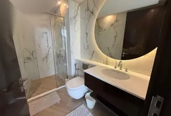 Fully Furnished 1-Bedroom Apartment with Sea View & Beach Access