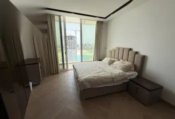 Fully Furnished 1-Bedroom Apartment with Sea View & Beach Access